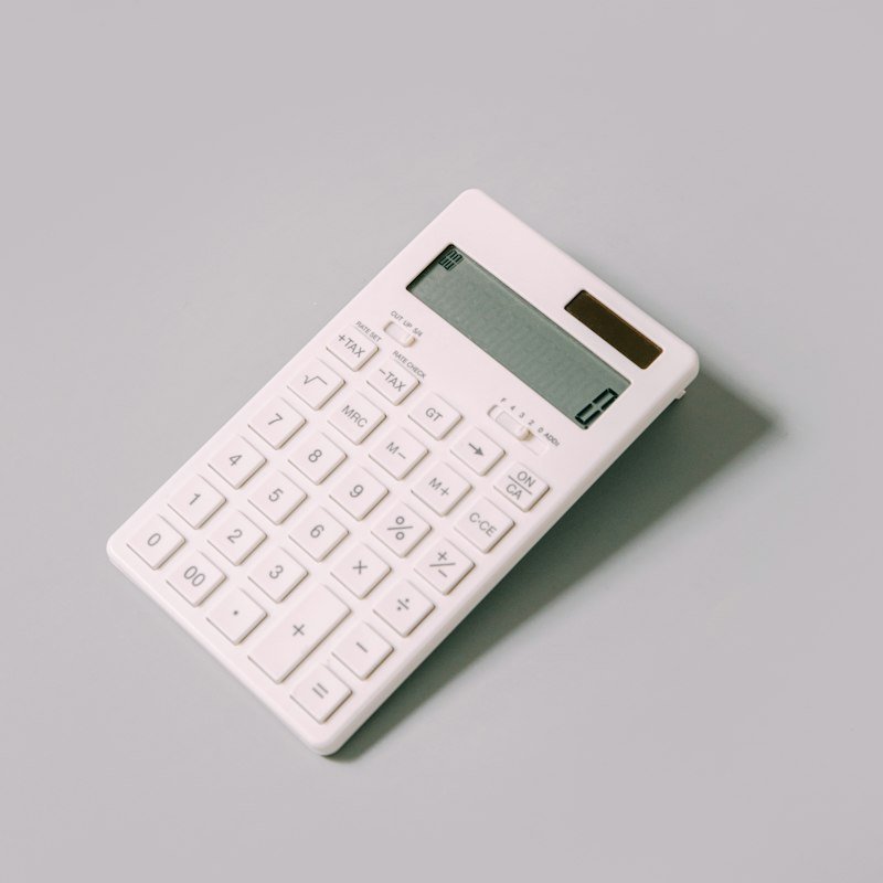 LMZ about gallery 2 Calculator on a clean white desk