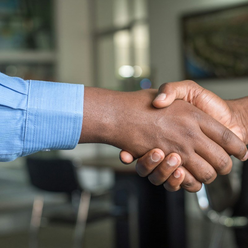LMZ about gallery 3 Two people shaking hands after a meeting